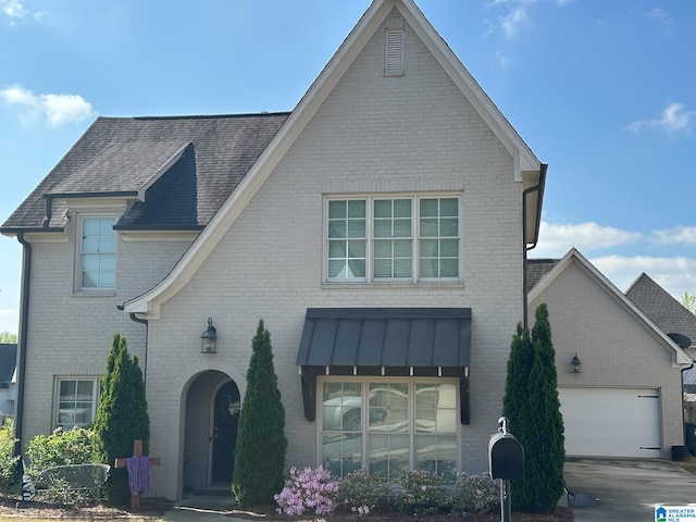 6037 Clubhouse Dr, Trussville, AL 35173 - view of front of home featuring brick siding and roof with shingles