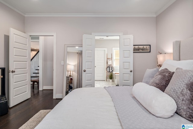 6037 Clubhouse Dr, Trussville, AL 35173 - bedroom with crown molding, dark wood-type flooring, ensuite bathroom, and recessed lighting
