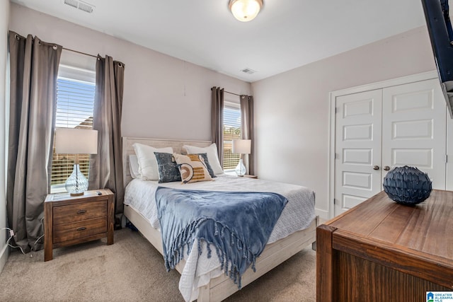 6037 Clubhouse Dr, Trussville, AL 35173 - bedroom featuring light colored carpet and a closet