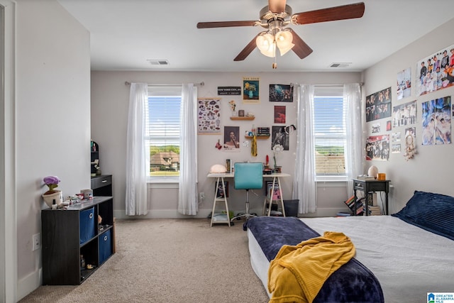 6037 Clubhouse Dr, Trussville, AL 35173 - bedroom with multiple windows, carpet floors, and ceiling fan