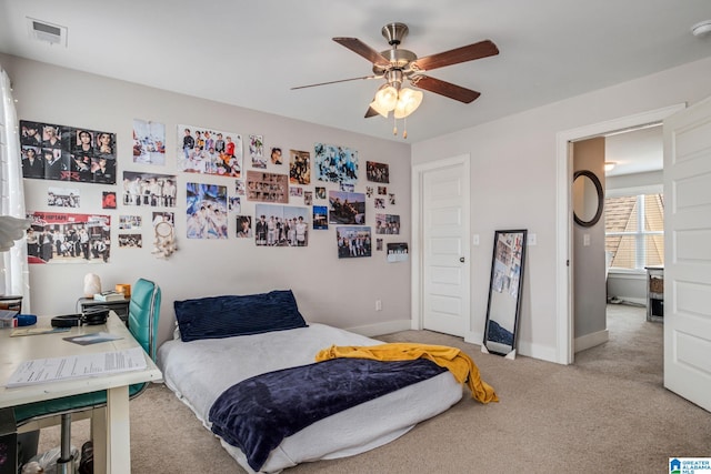 6037 Clubhouse Dr, Trussville, AL 35173 - carpeted bedroom with baseboards and a ceiling fan