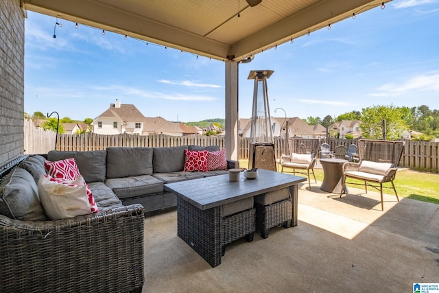 6037 Clubhouse Dr, Trussville, AL 35173 - fenced backyard with an outdoor hangout area, a patio, ceiling fan, and a residential view