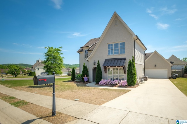 6037 Clubhouse Dr, Trussville, AL 35173 - view of front of property with a garage, brick siding, driveway, and a front lawn