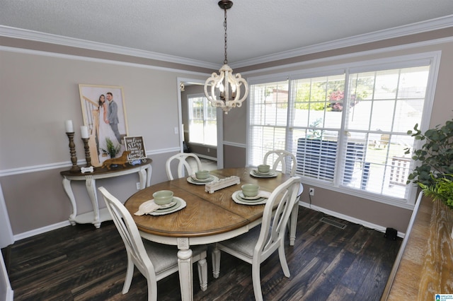 dining room with ornamental molding, baseboards, an inviting chandelier, and dark wood-style floors