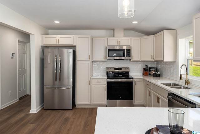 1121 Lawley St, Helena, AL 35080 - kitchen with stainless steel appliances, a sink, dark wood-type flooring, and tasteful backsplash