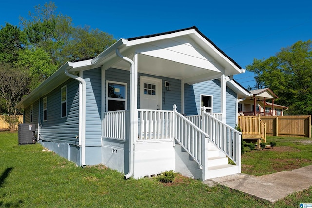 1121 Lawley St, Helena, AL 35080 - bungalow featuring central AC unit, a front lawn, and covered porch