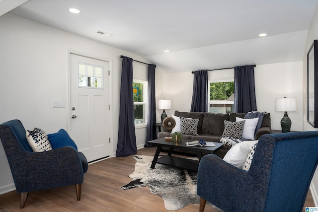 1121 Lawley St, Helena, AL 35080 - living room with vaulted ceiling, visible vents, baseboards, and wood finished floors