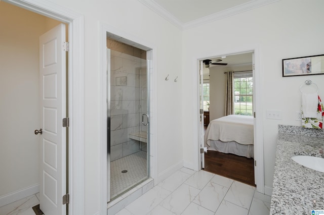 ensuite bathroom with a shower stall, marble finish floor, crown molding, baseboards, and ensuite bathroom