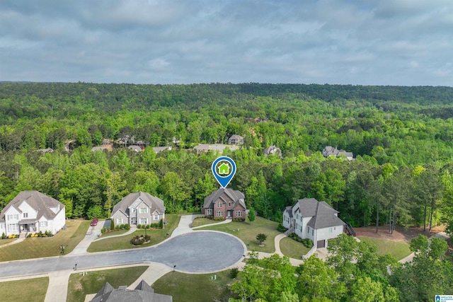 bird's eye view with a residential view and a forest view