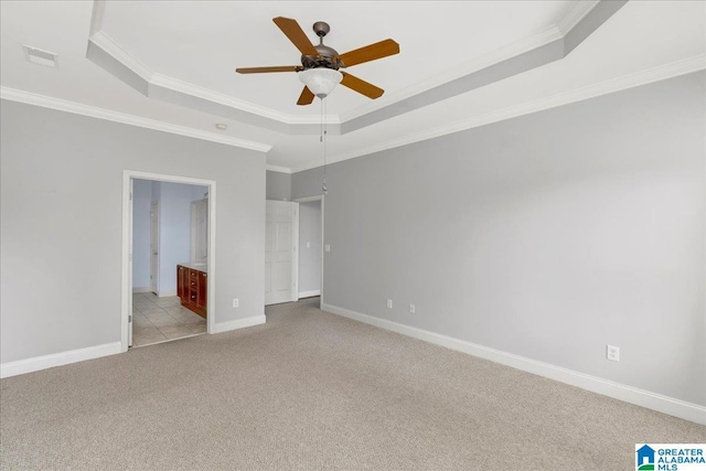 5592 Summit Pointe, Pinson, AL 35126 - unfurnished bedroom featuring visible vents, light colored carpet, ornamental molding, and a raised ceiling