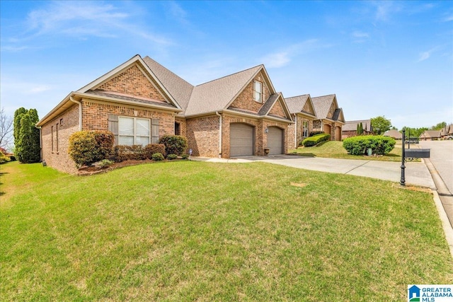 5592 Summit Pointe, Pinson, AL 35126 - view of front of house featuring brick siding, a front yard, a garage, and driveway