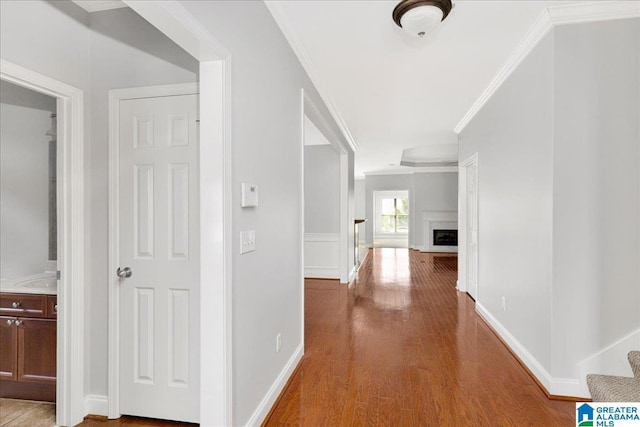 5592 Summit Pointe, Pinson, AL 35126 - hallway featuring crown molding, wood finished floors, and baseboards