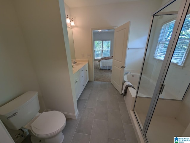 4206 Shinnecock Cir, Bessemer, AL 35022 - bathroom with ensuite bathroom, a shower stall, vanity, toilet, and tile patterned floors
