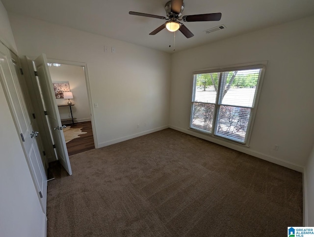 4206 Shinnecock Cir, Bessemer, AL 35022 - unfurnished bedroom featuring ceiling fan, baseboards, carpet, and visible vents