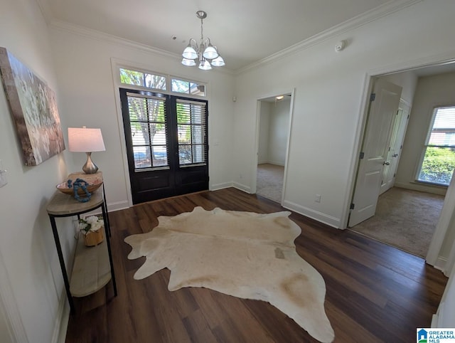 4206 Shinnecock Cir, Bessemer, AL 35022 - entryway featuring an inviting chandelier, ornamental molding, wood finished floors, french doors, and baseboards