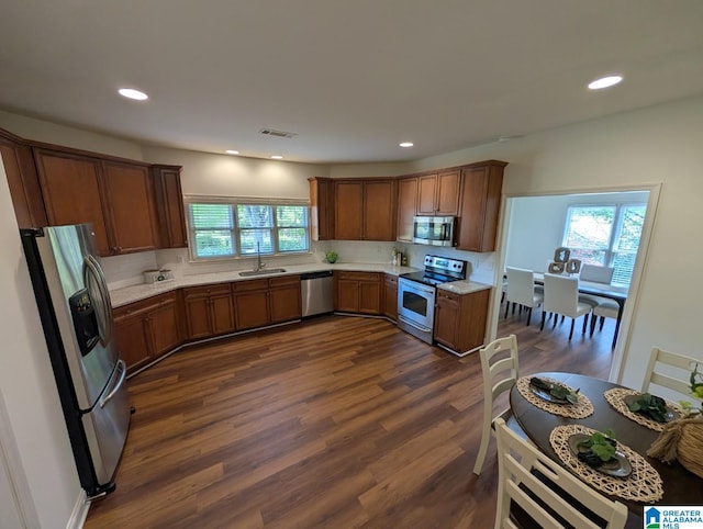 4206 Shinnecock Cir, Bessemer, AL 35022 - kitchen with tasteful backsplash, a sink, appliances with stainless steel finishes, dark wood-style floors, and recessed lighting