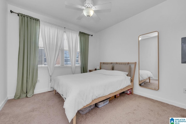 bedroom featuring baseboards, a ceiling fan, and carpet