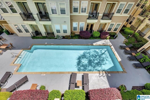 community pool with a patio
