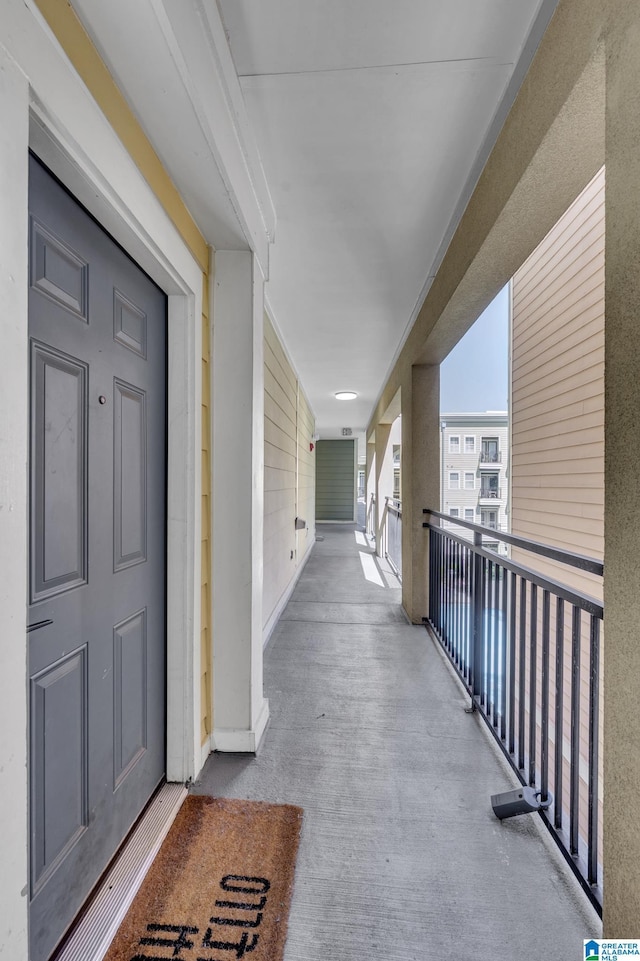 entrance to property with a balcony