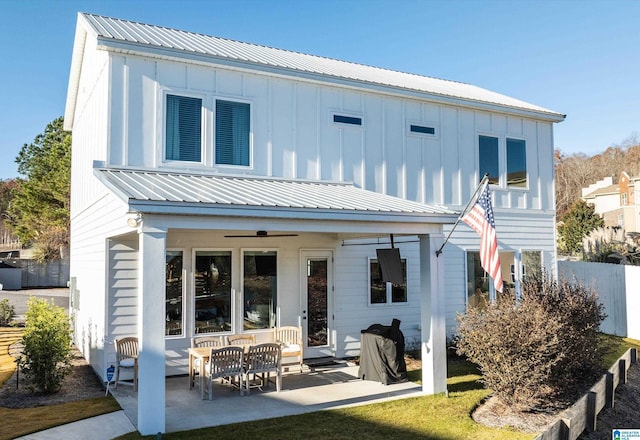 299 Williams Rd, Alexander City, AL 35010 - rear view of house featuring a patio, metal roof, and board and batten siding