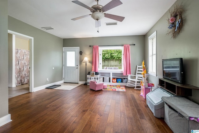 13563 Date St, Northport, AL 35475 - recreation room featuring visible vents, ceiling fan, hardwood / wood-style flooring, and baseboards
