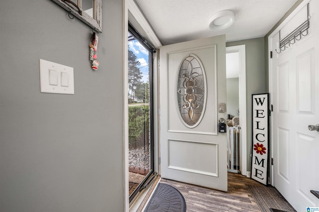 13563 Date St, Northport, AL 35475 - entrance foyer featuring wood finished floors