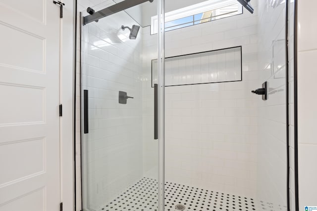 bathroom featuring a stall shower