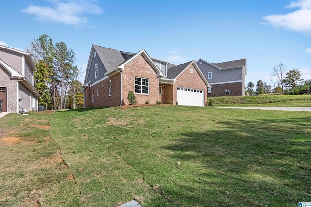 traditional-style house with a garage, a front yard, and brick siding
