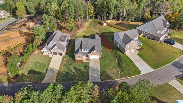 birds eye view of property with a residential view