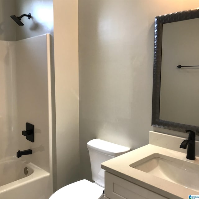 full bathroom with toilet, vanity, and bathing tub / shower combination