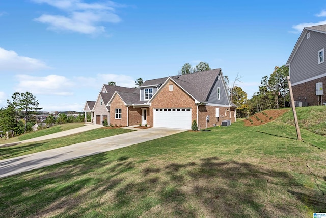traditional-style house with central air condition unit, a front yard, brick siding, an attached garage, and concrete driveway