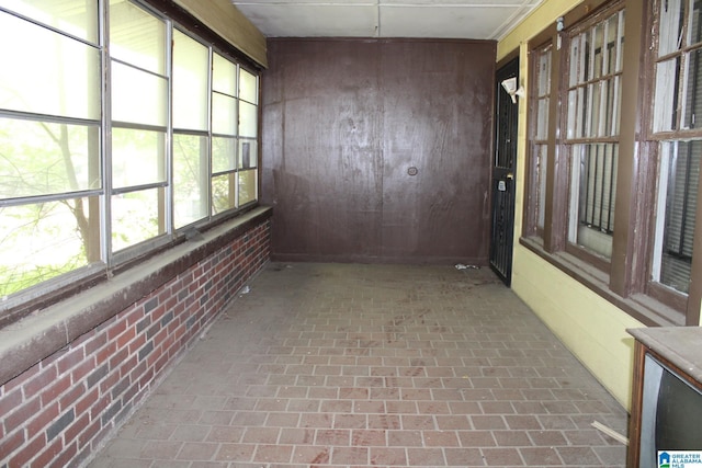 440 12th St W, Birmingham, AL 35208 - hall with brick floor and brick wall