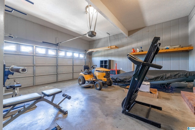 garage featuring a garage door opener