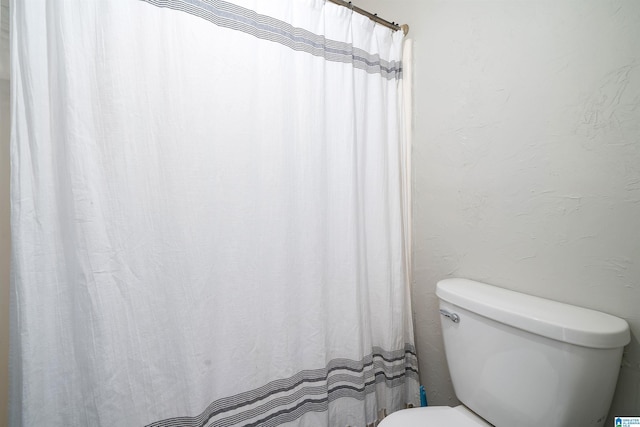 bathroom featuring toilet