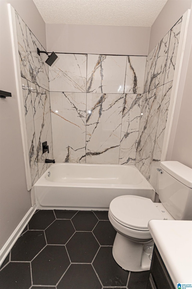 full bath with vanity, a textured ceiling, washtub / shower combination, and toilet