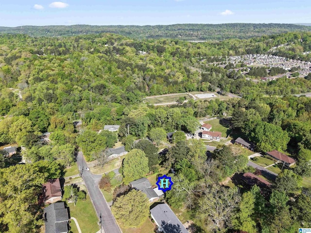 bird's eye view featuring a view of trees