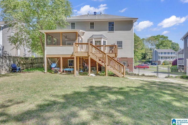 913 Falling Star Ln, Alabaster, AL 35007 - rear view of property with a fenced backyard, a lawn, stairway, a deck, and a sunroom