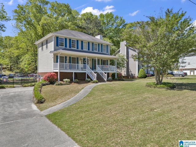 913 Falling Star Ln, Alabaster, AL 35007 - colonial inspired home with a chimney, stairs, a front lawn, driveway, and a porch