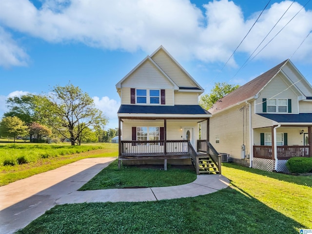 3 Holt Ave, Birmingham, AL 35214 - view of front of property with a front yard, covered porch, and central air condition unit