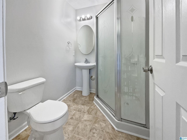 3 Holt Ave, Birmingham, AL 35214 - bathroom with a shower stall, baseboards, and toilet
