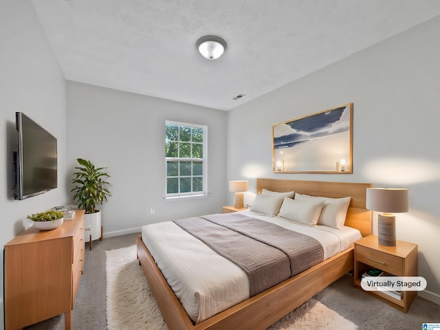 3 Holt Ave, Birmingham, AL 35214 - carpeted bedroom with visible vents and baseboards