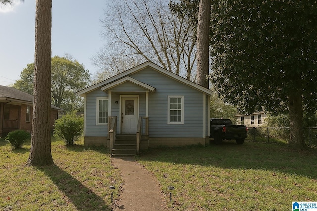 621 Bell Ave, Tarrant, AL 35217 - bungalow featuring fence and a front lawn