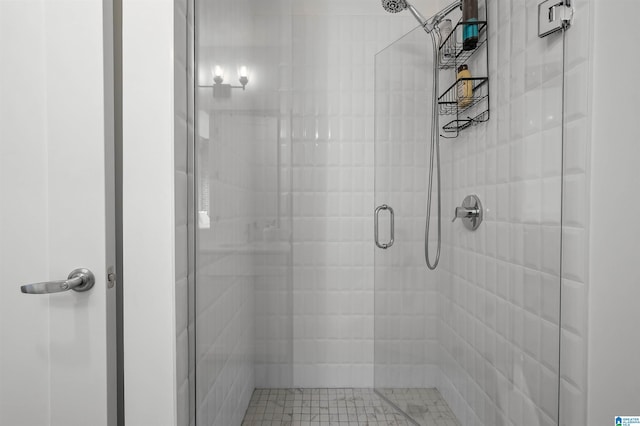 bathroom featuring a shower stall
