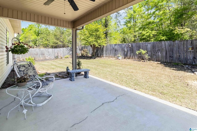 view of patio featuring a fenced backyard and a ceiling fan
