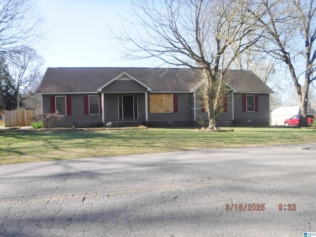 ranch-style home with crawl space, roof with shingles, and a front lawn