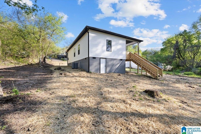 400 Ingram Ave W, Oneonta, AL 35121 - view of property exterior with central air condition unit and stairs