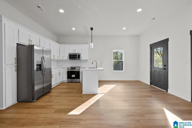 400 Ingram Ave W, Oneonta, AL 35121 - kitchen featuring visible vents, white cabinets, recessed lighting, appliances with stainless steel finishes, and light countertops
