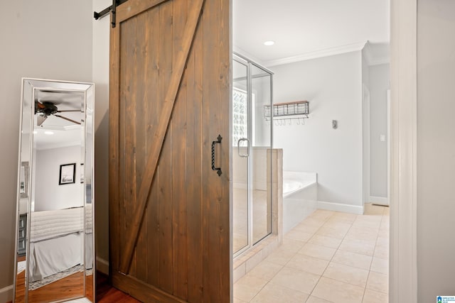 full bath featuring a bath, ceiling fan, ornamental molding, and a stall shower
