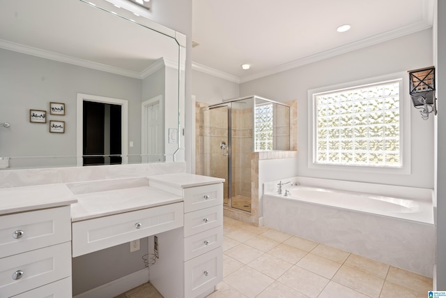 full bath featuring tile patterned floors, vanity, ornamental molding, a garden tub, and a stall shower