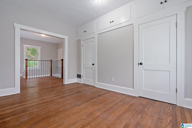 686 Ridge Top Cir, Birmingham, AL 35206 - interior space with visible vents, baseboards, and wood finished floors